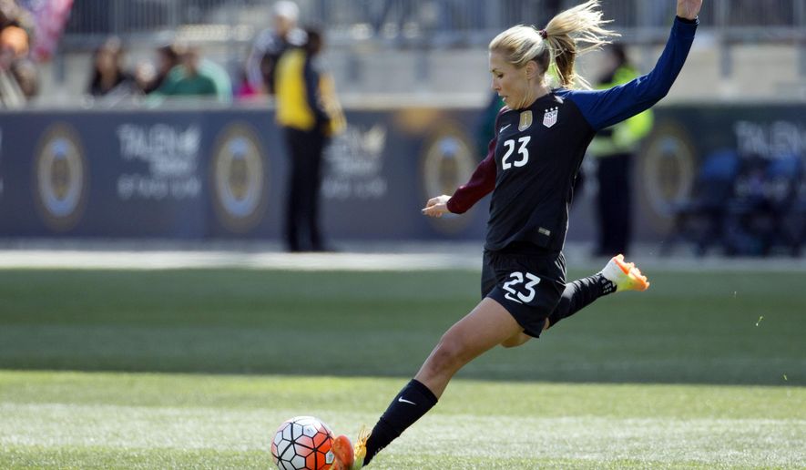 FILE - In this April 10, 2016, file photo, United States&#x27; Allie Long (23) plays the ball during the second half of an international friendly soccer match against Colombia in Chester, Pa. Long is among 23 players named to the team that was getting in its last three exhibition games this month before heading to Europe for the Women’s World Cup, which opens June 7. (AP Photo/Chris Szagola, File)