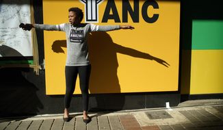 An African National Congress party (ANC) supporter gestures at a gathering at the ANC&#39;s headquarters in Johannesburg , South Africa, Sunday May 12, 2019 to celebrate their party&#39;s victory in South Africa&#39;s general election. President Cyril Ramaphosa is expected to address the rally. (AP Photo/Jerome Delay)