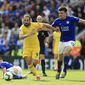 Chelsea&#x27;s Gonzalo Higuain, left, and Leicester City&#x27;s Harry Maguire (right) battle for the ball during their English Premier League soccer match at the King Power Stadium, Leicester, England, Sunday, May 12, 2019. (Mike Egerton/PA via AP)