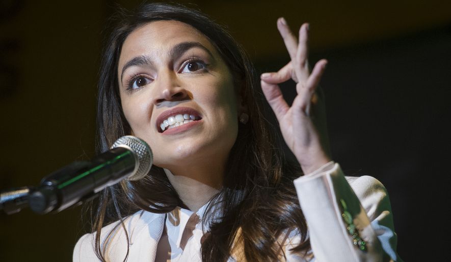 Rep. Alexandria Ocasio-Cortez, D-N.Y., speaks at the final event for the Road to the Green New Deal Tour at Howard University in Washington, Monday, May 13, 2019. (AP Photo/Cliff Owen)
