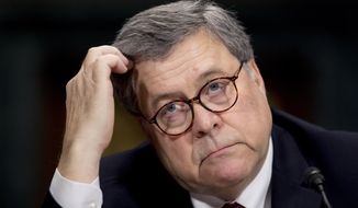 In this May 1, 2019, photo, Attorney General William Barr appears at a Senate Judiciary Committee hearing on Capitol Hill in Washington.  Barr has appointed a U.S. attorney to examine the origins of the Russia investigation and determine if intelligence collection involving the Trump campaign was “lawful and appropriate.” (AP Photo/Andrew Harnik) **FILE**