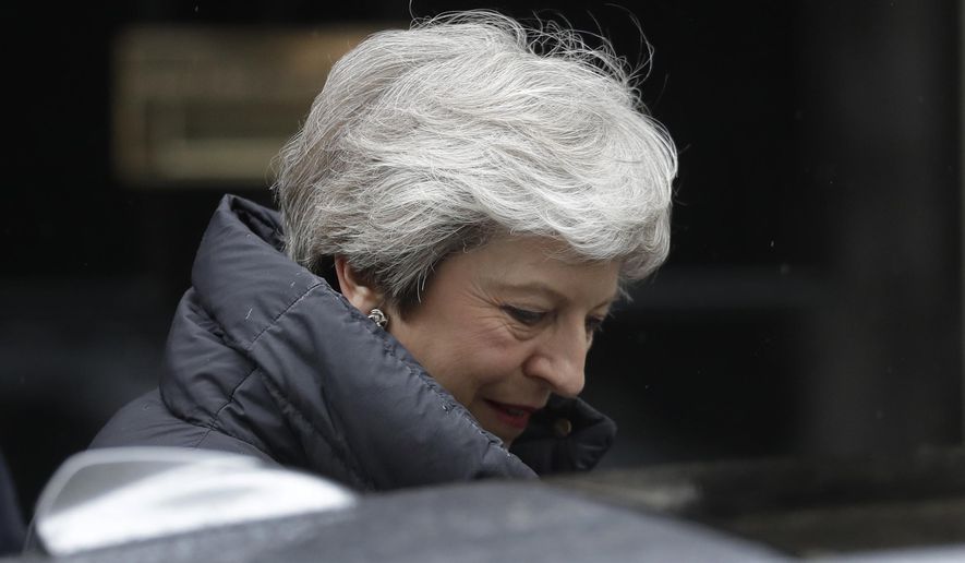 British Prime Minister Theresa May leaves 10 Downing Street in London, to attend Prime Minister&#39;s Questions at the Houses of Parliament, Wednesday, May 8, 2019. (AP Photo/Matt Dunham)