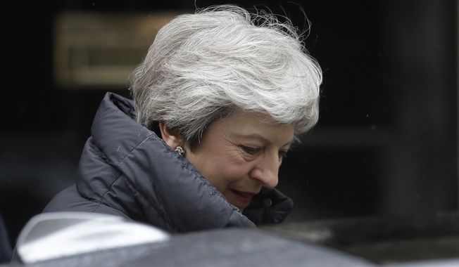 British Prime Minister Theresa May leaves 10 Downing Street in London, to attend Prime Minister&#x27;s Questions at the Houses of Parliament, Wednesday, May 8, 2019. (AP Photo/Matt Dunham)