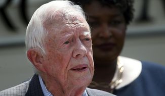 In this Sept. 18, 2018, photo, former President Jimmy Carter speaks during a news conference, in Plains, Ga. A spokeswoman says former U.S. President Jimmy Carter says he has broken his hip. She said that Carter underwent surgery at a medical center in Americus, Ga. (AP Photo/John Bazemore) **FILE**