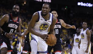 Houston Rockets&#39; James Harden, left, and Golden State Warriors&#39; Kevin Durant (35) react to a referee&#39;s call during the second half of Game 5 of a second-round NBA basketball playoff series Wednesday, May 8, 2019, in Oakland, Calif. (AP Photo/Ben Margot) **FILE**
