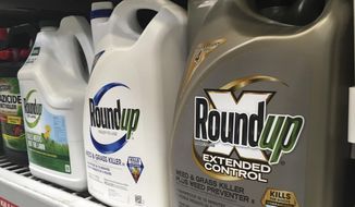 FILE - In this Feb. 24, 2019, file photo, containers of Roundup are displayed on a store shelf in San Francisco. A Northern California jury ordered agribusiness giant Monsanto Co. to pay a combined $2.05 billion to a couple who claimed the company&#39;s popular weed killer Roundup Ready caused their cancers. The Oakland jury on Monday, May 13, 2019, delivered Monsanto&#39;s third such loss in California since August. Alva and Alberta Pilliod claimed they used Roundup for more than 30 years to landscape. They were both diagnosed with non-Hodgkin&#39;s lymphoma. Monsanto owner Bayer said it would appeal. (AP Photo/Haven Daley, File)