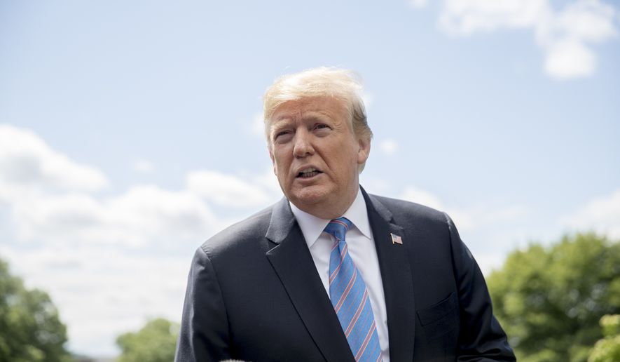 President Donald Trump listens to a question from a member of the media on the South Lawn of the White House in Washington, Tuesday, May 14, 2019, before boarding Marine One for a short trip to Andrews Air Force Base, Md., to travel to Louisiana. (AP Photo/Andrew Harnik)