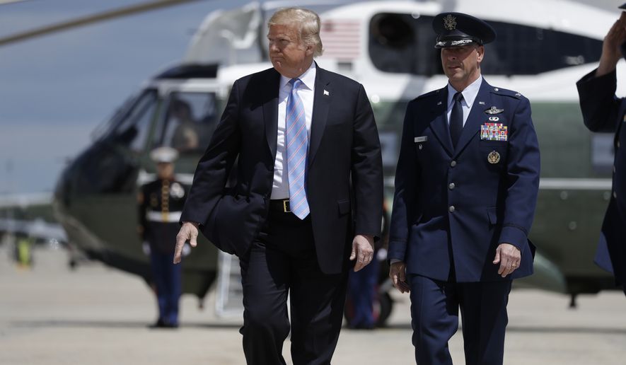 President Donald Trump walks to board Air Force One for a trip to Louisiana to deliver remarks on energy infrastructure, Tuesday, May 14, 2019, in Andrews Air Force Base, Md. (AP Photo/Evan Vucci)
