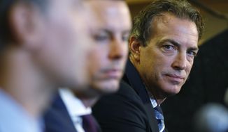 FILE - In this Aug. 31, 2016, file photo, Colorado Avalanche general manager Joe Sakic, right, look on during a news conference to introduce Jared Bednar as the NHL hockey club&#39;s new coach in Denver. After a week for reflection following a Game 7 loss in the second-round of the NHL Playoffs, Sakic has headed back to work to prepare for the upcoming NHL Draft. (AP Photo/David Zalubowski, File)