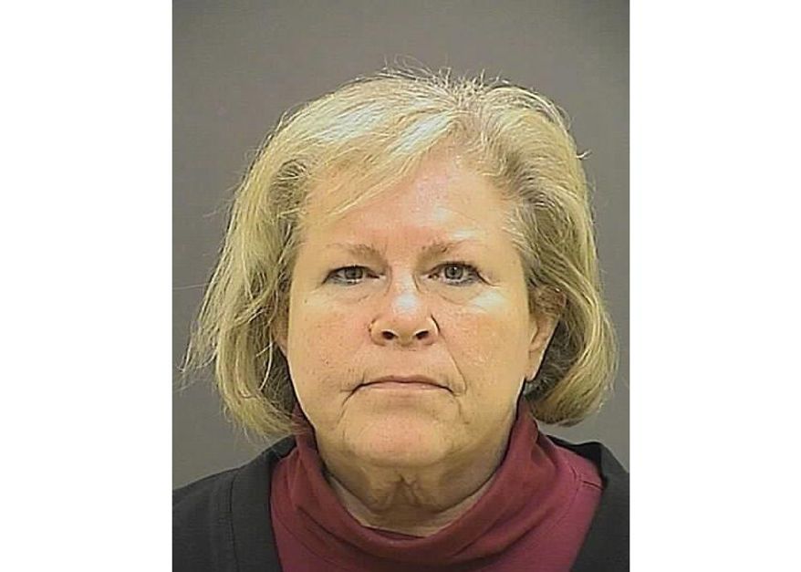 FILE - This undated file photo provided by the Baltimore Police Department shows former Episcopal Bishop Heather Cook. Cook, who fatally struck a bicyclist while drunk and texting behind the wheel more than four years ago, has been released from a Maryland prison. She was the second-highest-ranking Episcopal leader in the mid-Atlantic state when the fatal Baltimore crash occurred two days after Christmas 2014. Her lawyer says she was released Tuesday, May 14, 2019, from the Maryland Correctional Institute for Women. (Baltimore Police Department via AP, File)