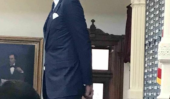Retired Dallas Mavericks start Dirk Nowitzki stands before the Texas House on Tuesday, May 14, 2019, in Austin, Texas. Nowitzki was honored by Gov. Greg Abbott and Texas lawmakers for his outstanding 21-year career with the same NBA team. (Gardner Selby/The Dallas Morning News via AP)