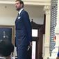 Retired Dallas Mavericks start Dirk Nowitzki stands before the Texas House on Tuesday, May 14, 2019, in Austin, Texas. Nowitzki was honored by Gov. Greg Abbott and Texas lawmakers for his outstanding 21-year career with the same NBA team. (Gardner Selby/The Dallas Morning News via AP)