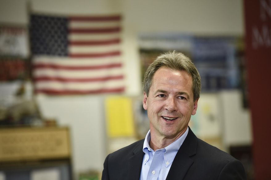 Montana Gov. Steve Bullock, Democratic presidential candidate, officially announces his campaign for president Tuesday, May 14, 2019, at Helena High School in Helena, Mont. (Thom Bridge/Independent Record via AP)