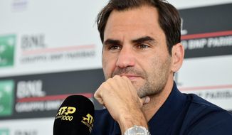 Switzerland&#39;s Roger Federer looks on during a press conference at the Italian Open tennis tournament, in Rome, Italy, Tuesday, May 14, 2019. (Ettore Ferrari/ANSA via AP)