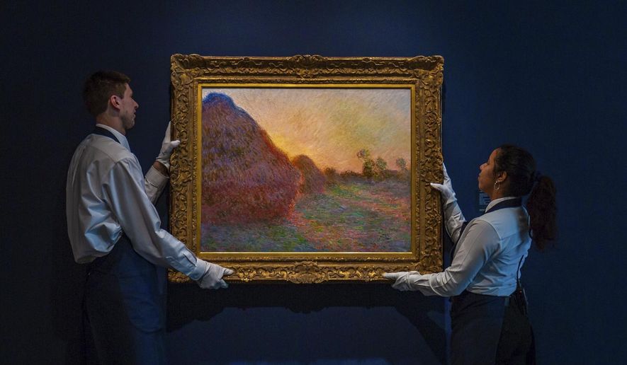 This undated photo provided by Sotheby's shows Claude Monet's painting titled "Meules." The painting, one of Monet's iconic paintings of haystacks, has fetched a record $110.7 million at an auction in New York. The 1890 painting sold at Sotheby's sale of Impressionist & Modern Art Tuesday night, May 14, 2019. (Courtesy Sotheby's via AP)