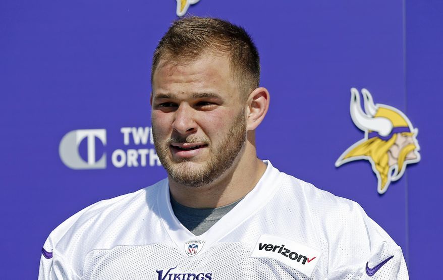 Minnesota Vikings first round draft pick, center Garrett Bradbury, addresses the media after rookie minicamp workouts at the NFL football team's complex Friday, May 3, 2019, in Eagan, Minn. Bradbury played at North Carolina State. (AP Photo/Jim Mone)