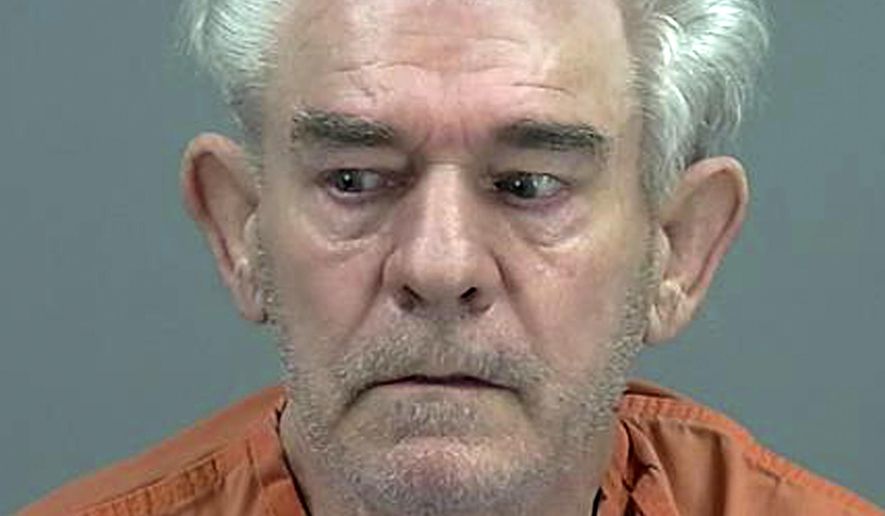This undated photo released by the Pinal County Adult Detention Center shows Rodney Puckett. Police in Arizona say a detective making a traffic stop on Interstate 10 was speaking to a driver from Oklahoma when he noticed the man's dead wife in the passenger seat. Eloy police said in a statement that Puckett said Monday, May 13, 2019, that Linda Puckett died at a hotel in Texas and that he put her body in their vehicle before continuing their trip. Puckett was arrested on suspicion of abandonment or concealment of a dead body. (Pinal County Adult Detention Center via AP)