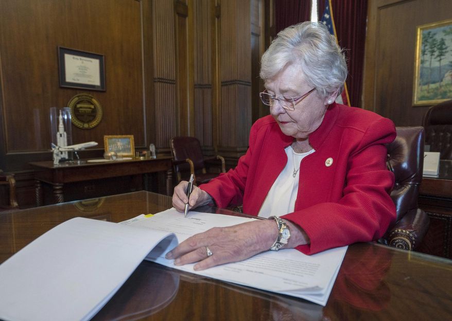 A spokeswoman for Alabama Gov. Kay Ivey said the bill is undergoing a legal review before the governor decides whether to sign it. (Associated Press)