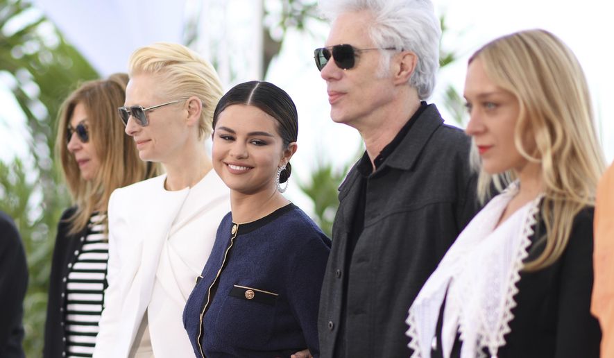 Actors Sara Driver, from left, Tilda Swinton, Selena Gomez, director Jim Jarmusch and actress Chloe Sevigny pose for photographers at the photo call for the film 'The Dead Don't Die' at the 72nd international film festival, Cannes, southern France, Wednesday, May 15, 2019. (Photo by Arthur Mola/Invision/AP)