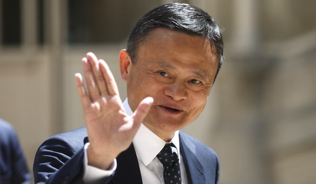 Founder of Alibaba group Jack Ma arrives for the Tech for Good summit, Wednesday, May 15, 2019 in Paris. World leaders and tech bosses meet Wednesday in Paris to discuss ways to prevent social media from spreading deadly ideas. (AP Photo/Thibault Camus)