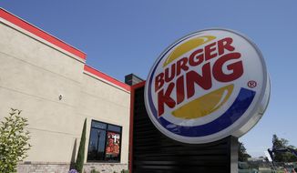 This April 25, 2019, file photo shows a Burger King in Redwood City, Calif. (AP Photo/Jeff Chiu, File)