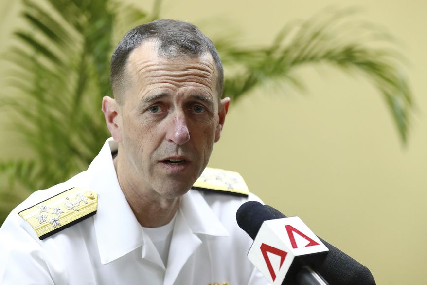 Then-U.S. Chief of Naval Operations Adm. John Richardson fields questions during a media roundtable on the sidelines of the International Maritime Defense Exhibition in Singapore, Wednesday, May 15, 2019. (AP Photo/Yong Teck Lim) ** FILE **