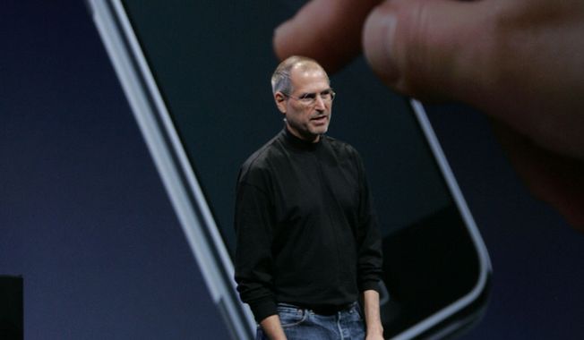 Apple CEO Steve Jobs talks about the new iPhone during his keynote address at MacWorld Conference &amp; Expo in San Francisco, Tuesday, Jan. 9, 2007. (AP Photo/Paul Sakuma)
