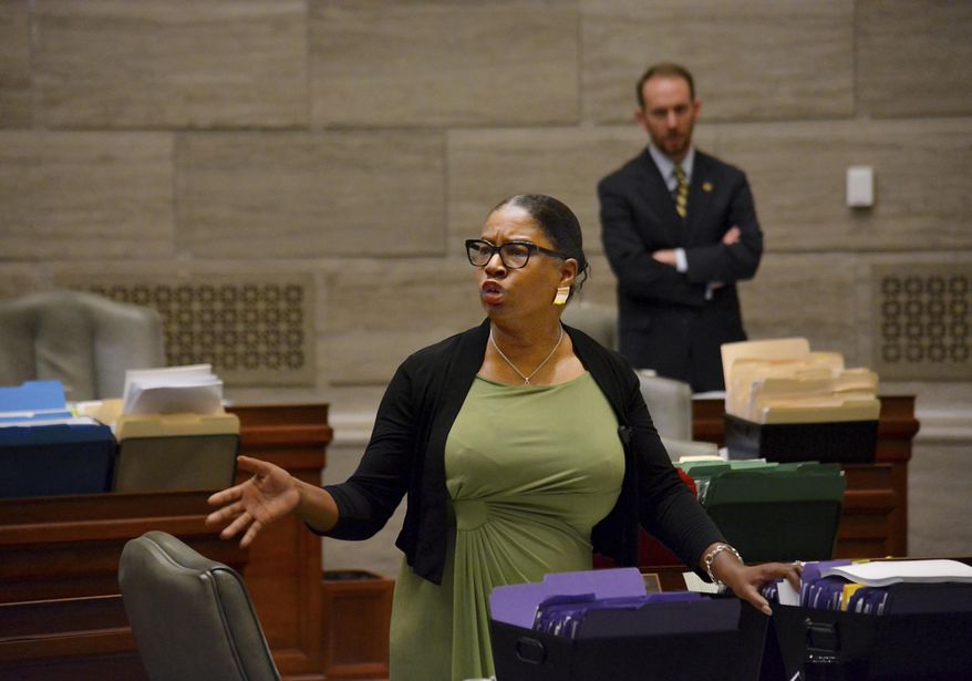 During debate in the Missouri Senate in Jefferson City Wednesday, May 15, 2019, Freshman senator, Karla May, D-St. Louis, makes a point regarding Missouri's proposed new abortion law. Opponents of the bill have begun efforts to block it in that legislative body. The bill would prohibit an abortion after the unborn baby's heartbeat is detected. (Sally Ince/The Jefferson City News-Tribune via AP)