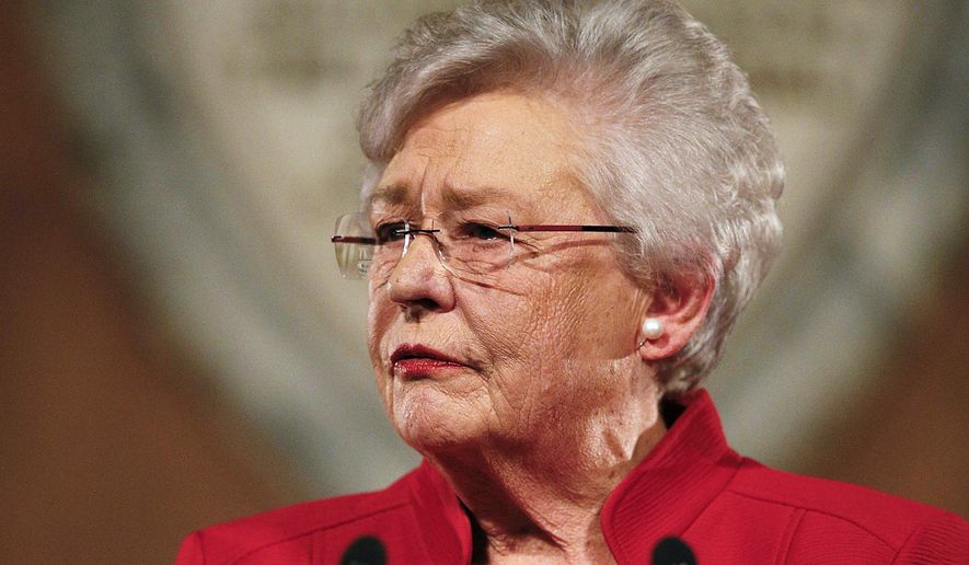 In this Jan. 9, 2018, file photo, Alabama Gov. Kay Ivey delivers the annual State of the State address at the Capitol in Montgomery, Ala. Ivey signed the nation's strictest abortion ban into law on Wednesday, May 15, 2019, making performing an abortion a felony in nearly all cases, punishable by up to life in prison, and with no exceptions for rape and incest. (AP Photo/Brynn Anderson, File)