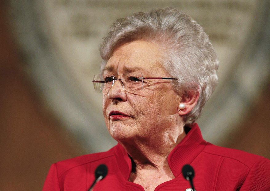 In this Jan. 9, 2018, file photo, Alabama Gov. Kay Ivey delivers the annual State of the State address at the Capitol in Montgomery, Ala. Ivey signed the nation's strictest abortion ban into law on Wednesday, May 15, 2019, making performing an abortion a felony in nearly all cases, punishable by up to life in prison, and with no exceptions for rape and incest. (AP Photo/Brynn Anderson, File)