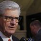 FILE - This is a Jan. 30, 2019 file photograph of Gov. Phil Bryant, following a bill signing at the Capitol in Jackson, Miss. Bryant, who is on a trade mission to the central Asian country of Uzbekistan, is accompanied by a number of people from the private sector and state government including Mississippi National Guard Adjutant Gen. Durr Boyles. The Mississippi National Guard and the Uzbekistan military have been jointly training for six years in a state partnership program. (AP Photo/Rogelio V. Solis, File)