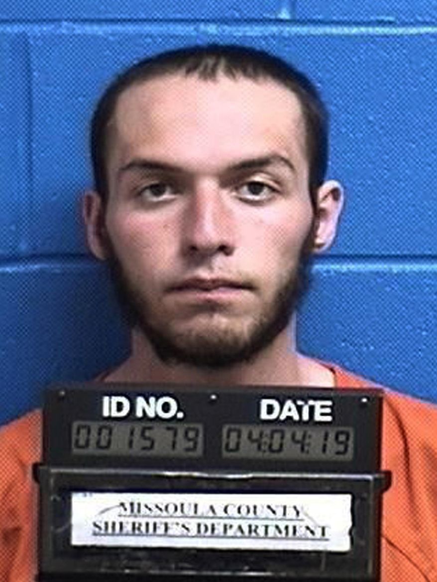 FILE - This April 4, 2019, file photo released by the Missoula County Sheriff's Office shows Fabjan Alameti, 21. Alameti, who federal agents say talked about joining an Islamic State group and attacking random people to avenge a shooting at two New Zealand mosques, has been ordered held in custody pending his June 24 trial in Montana. A U.S magistrate judge ruled Alameti, who has pleaded not guilty to possession of a firearm by an unlawful user of a controlled substance and making false statements involving international and domestic terrorism, poses too great a threat to the community to return to his mother's apartment in the Bronx. (Missoula County Sheriff's Office via AP, File)