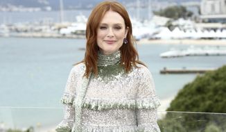 Actress Julianne Moore poses for photographers at the photo call for the film &#39;The Staggering Girl&#39; at the 72nd international film festival, Cannes, southern France, Friday, May 17, 2019. (Photo by Joel C Ryan/Invision/AP)