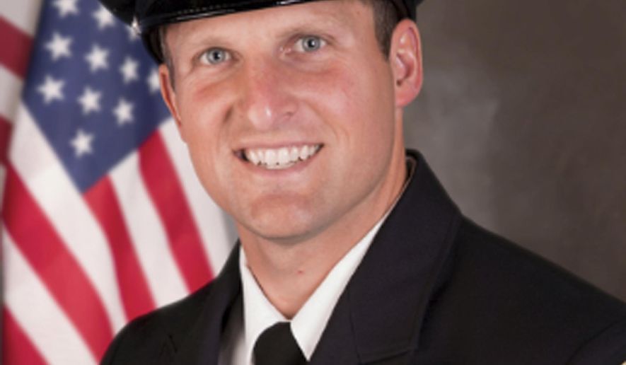 This undated photo provided by the Appleton, Wis., Police Department shows Appleton firefighter Mitch Lundgaard. Lundgaard was killed in a shooting at a Wisconsin bus station while responding to an emergency call Wednesday, May 15, 2019. A call to assist a man thought to be having a medical emergency on a bus escalated into a shooting that ended with the man and Lundgaard dead and two others hurt. (Appleton Police Department via AP)