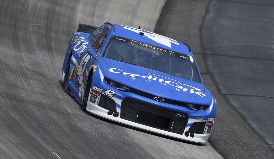 Kyle Larson (42) competes during the NASCAR Cup Series auto race, Monday, May 6, 2019, at Dover International Speedway in Dover, Del. (AP Photo/Will Newton)