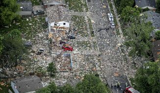 This aerial photo shows the scene of a deadly home explosion in Jeffersonville, Ind., on Sunday, May 19, 2019. (Michael Clevegner/Courier Journal via AP)