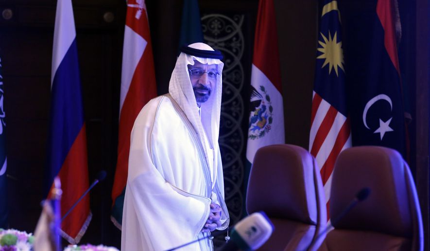 Saudi Minister of Energy, Industry and Mineral Resources Khalid al-Falih prepares to chair a meeting of energy ministers from OPEC and its allies to discuss prices and production cuts, in Jiddah, Saudi Arabia, Sunday, May 19, 2019. The meeting takes places as tensions flare in the Persian Gulf after the U.S. ordered bombers and an aircraft carrier to the region over an unexplained threat they perceive from Iran, which comes a year after the U.S. unilaterally pulled out of Tehran's nuclear deal with world powers and reimposed sanctions on Iranian oil. (AP Photo/Amr Nabil)