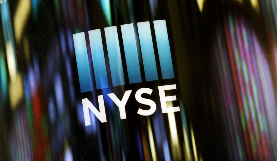 FILE - In this May 13, 2019 file photo, the NYSE logo is displayed at the New York Stock Exchange. A broad slide by technology companies pushed U.S. stocks lower in morning trading on Wall Street Monday, May 20 extending losses into another week. The U.S. decision to ban technology sales to China’s Huawei hammered the technology sector, particularly chipmakers. (AP Photo/Mark Lennihan, File)