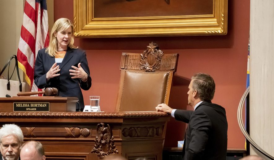House Speaker Melissa Hortman talks with Republican House Minority Leader Kurt Daudt on the House floor Monday, May 20, 2019 at the State house in Saint Paul. glen.stubbe@startribune.com Monday, May 20, 2019. (Glen Stubbe/Star Tribune via AP)