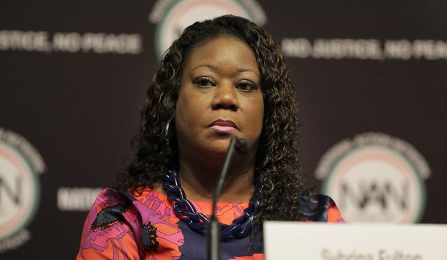 FILE - In this April 3, 2019 photo, Sybrina Fulton participates in a panel at the National Action Network Convention in New York. Fulton, a mother who turned to activism after the slaying of her black teen son Trayvon Martin, has announced she is running for office in Miami. The Miami Herald reports Fulton will be entering the race to join the 13-member board of Miami-Dade County commissioners. Fulton said in a Saturday, May 18 statement that she would continue working to end gun violence. She will challenge Miami Gardens Mayor Oliver Gilbert for the seat that is up for grabs in 2020 because of term limits.  (AP Photo/Seth Wenig, File)