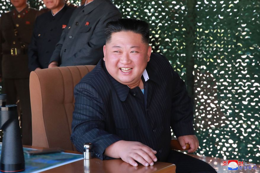 FILE - This May 9, 2019, file photo provided on May 10, by the North Korean government shows North Korean leader Kim Jong Un, observing a military test in North Korea. North Korea has labeled Joe Biden a &quot;fool of low IQ&quot; and an &quot;imbecile bereft of elementary quality as a human being&quot; after the Democratic presidential hopeful during a recent speech called North Korean leader Kim Jong Un a tyrant. Independent journalists were not given access to cover the event depicted in this image distributed by the North Korean government. The content of this image is as provided and cannot be independently verified. Korean language watermark on image as provided by source reads: &quot;KCNA&quot; which is the abbreviation for Korean Central News Agency. (Korean Central News Agency/Korea News Service via AP, File)
