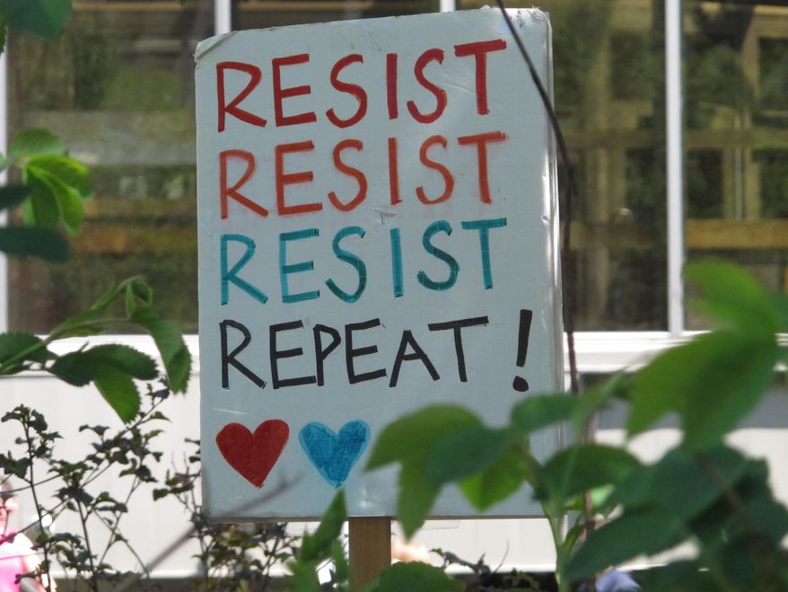 This sign was among those dotting a gathering of abortion rights advocates in Juneau, Alaska on Tuesday, May 21, 2019. Several states have taken steps to ban or severely restrict abortions, and a bill was introduced in the Alaska House that seeks to outlaw abortion. (AP Photo/Becky Bohrer)