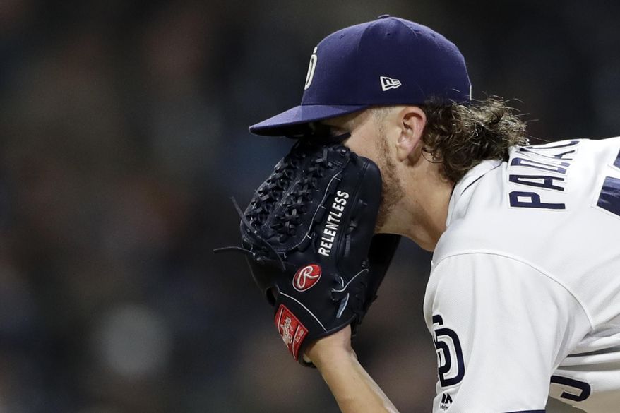 San Diego Padres starting pitcher Chris Paddack looks in as he works against an Arizona Diamondbacks batter during the sixth inning of a baseball game Monday, May 20, 2019, in San Diego. (AP Photo/Gregory Bull)