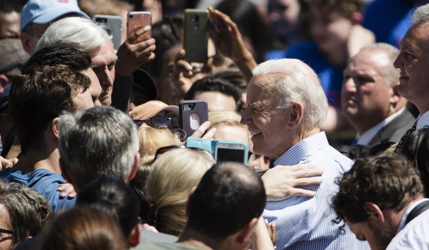 Democratic presidential candidate, former Vice President Joe Biden meets with attendees during a campaign rally at Eakins Oval in Philadelphia, Saturday, May 18, 2019. (AP Photo/Matt Rourke)