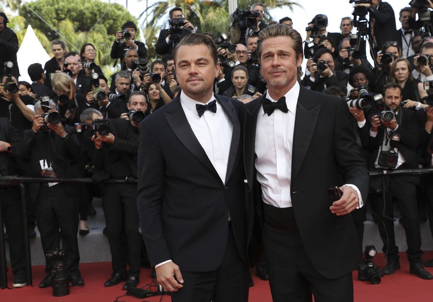 Actors Leonardo DiCaprio, left, and Brad Pitt pose for photographers upon arrival at the premiere of the film &#x27;Once Upon a Time in Hollywood&#x27; at the 72nd international film festival, Cannes, southern France, Tuesday, May 21, 2019. (Photo by Vianney Le Caer/Invision/AP)
