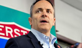 FILE - In this March 26, 2019, file photo, Kentucky Gov. Matt Bevin speaks with the media during an event about the new Interstate 165 in Bowling Green, Ky. Kentucky Republicans will give an initial verdict on Bevin’s job performance in the state&#39;s primary election Tuesday, May 21. Meanwhile, Democrats will choose from three prominent candidates looking to challenge Bevin, an ally of President Donald Trump.  (Bac Totrong/Daily News via AP, File)