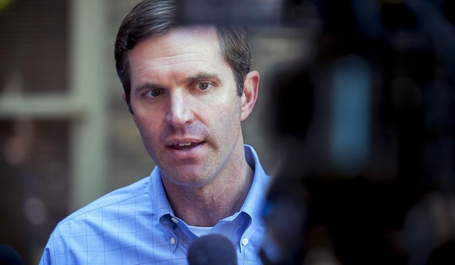 Kentucky attorney general and Democratic gubernatorial candidate Andy Beshear talks with reporters during a campaign stop at Spencer's Coffee, Friday, May 17, 2019 in Bowling Green, Ky. (Bac Totrong/Daily News via AP)
