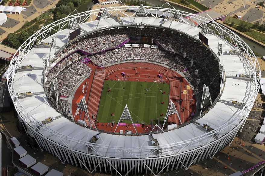 FILE - In this Aug. 3, 2012, file photo, Olympic Stadium is viewed during the Summer Olympics at Olympic Park in London. The traditional rivalry New York Yankees and the Boston Red Sox will take a radical twist when they meet in London next month: They will play on artificial turf for the first time in more than 2,200 games over a century. Major League Baseball has access to Olympic Stadium for 21 days before the games on June 29 and 30, the sport's first regular-season contests in Europe, and just five days after to clear out. (AP Photo/Jeff J Mitchell, Pool, File)
