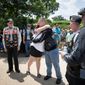 Legionnaire Charles Webb hugs Gold Star Mother Barbara Bilbrey, center, while World War II veteran Bruce Heilman, and Phil Perlman, left and right, join Legion members to lay a wreath at the Civil War Unknown Monument during the American Legion Riders Run To The Thunder in Washington, D.C., on Saturday, May 26, 2018. (Photo by Cheryl Diaz Meyer / The American Legion)