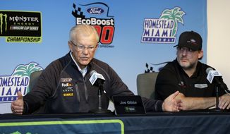 Joe Gibbs, owner of Joe Gibbs Racing, left, speaks during a news conference for the NASCAR Cup series auto race at the Homestead-Miami Speedway, Friday, Nov. 16, 2018, in Homestead, Fla. At right is Tony Stewart, owner of Stewart-Haas Racing. (AP Photo/Terry Renna) **FILE**

